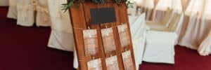 Wedding guest seating chart on wooden board